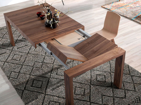 Rectangular extendable walnut dining table