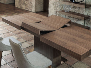 Rectangular extendable walnut dining table
