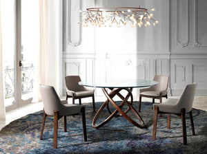 Round dining table in tempered glass and walnut