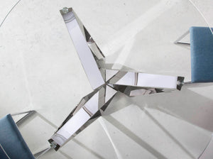 Round dining table in tempered glass and chromed steel