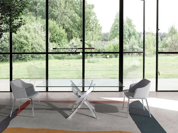 Rectangular dining table in tempered glass and chromed steel