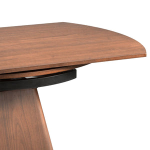 Round extendable walnut dining table