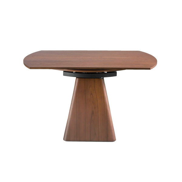 Round extendable walnut dining table