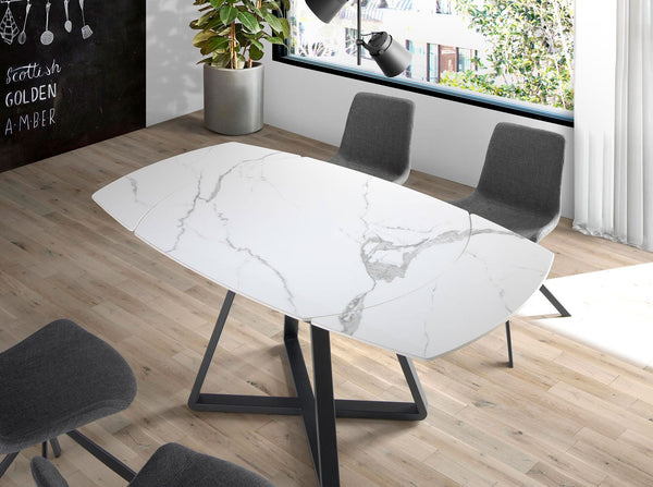 Extendable oval barrel dining table in porcelain marble and black steel