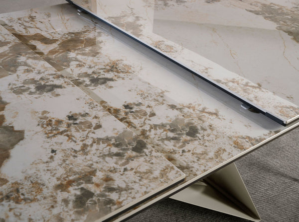 Rectangular extendable dining table in porcelain marble and champagne-colored steel