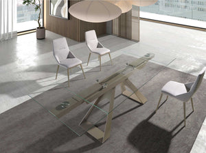 Extendable rectangular dining table with tempered glass and champagne-colored steel