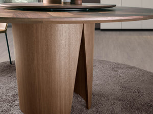 Round walnut dining table