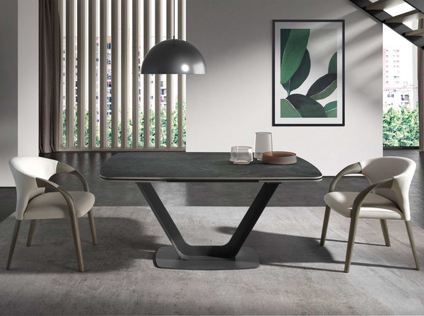 Extendable oval barrel dining table in porcelain marble and black steel