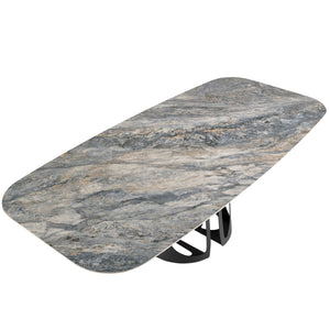 Oval barrel dining table in porcelain marble and black steel