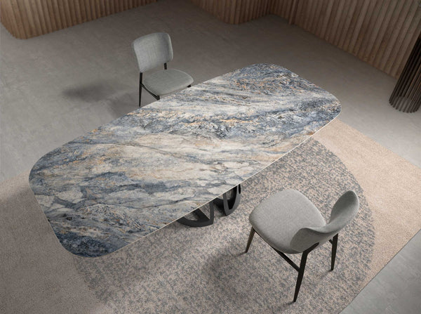 Oval barrel dining table in porcelain marble and black steel
