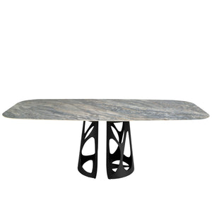 Oval barrel dining table in porcelain marble and black steel