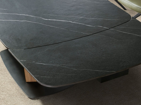 Extendable oval dining table with porcelain marble and walnut barrel