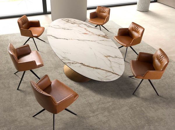 Extendable oval dining table with porcelain marble and bronzed steel barrel