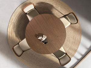 Round dining table in walnut and metallic sand steel