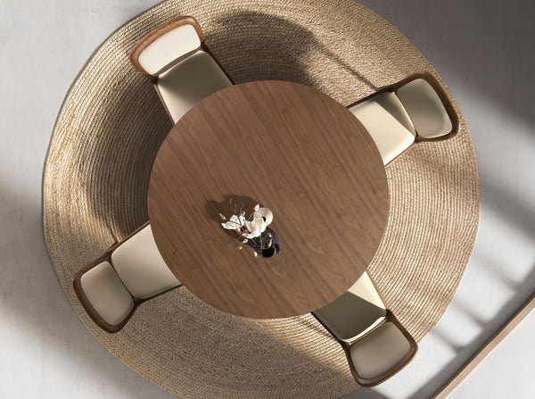 Round dining table in walnut and metallic sand steel