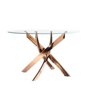 Round dining table in tempered glass and pink steel