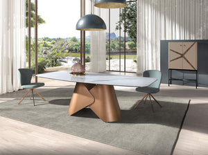 Oval dining table with porcelain marble barrel and bronze-colored steel barrel