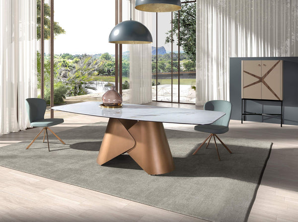 Oval dining table with porcelain marble barrel and bronze-colored steel barrel