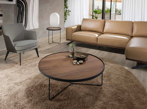 Round coffee table in walnut and black steel