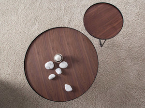 Round coffee table in walnut and black steel