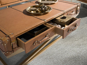 Rectangular coffee table in leather and gold steel