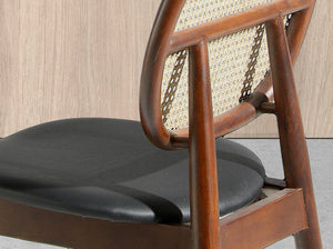 Black eco-leather and wicker chair