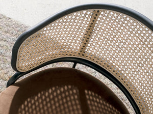 Brown wicker and velvet swivel chair