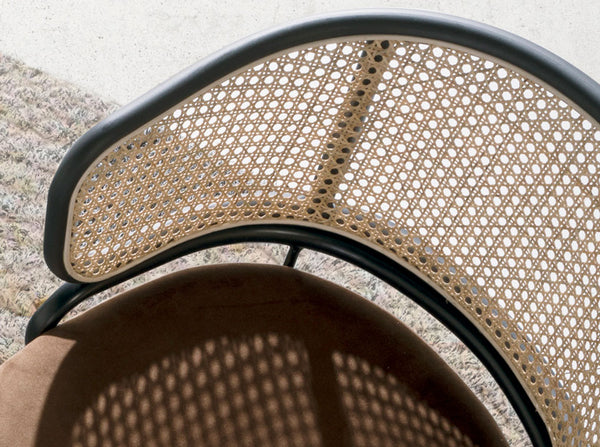 Brown wicker and velvet swivel chair