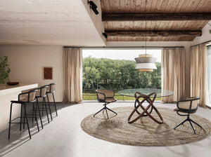 Brown wicker and velvet swivel chair