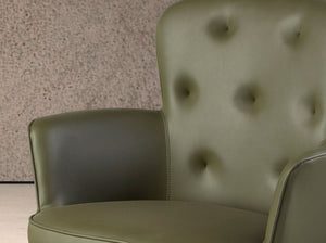 Dark green leather swivel chair