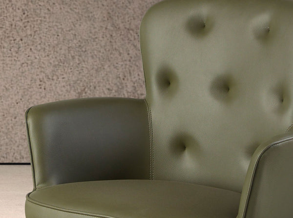 Dark green leather swivel chair
