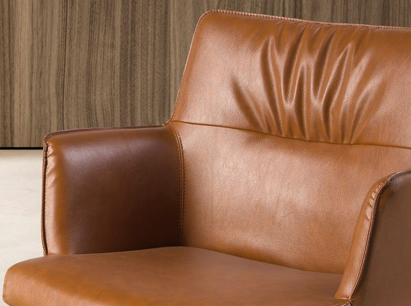 Cognac brown leather swivel chair