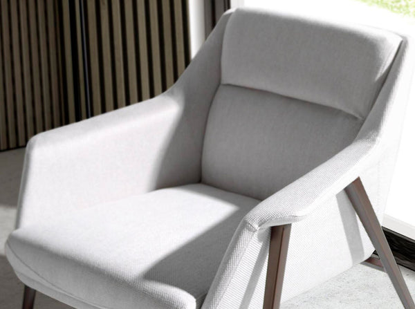 White fabric armchair