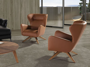 Swivel armchair in brown eco-leather