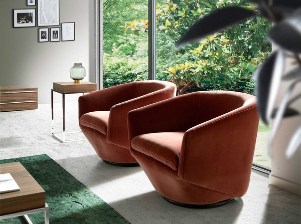 Swivel armchair in peach velvet
