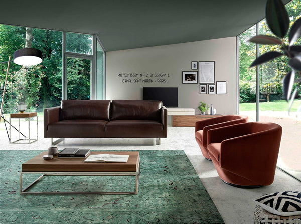 Swivel armchair in peach velvet