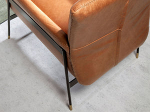 Brown leather armchair
