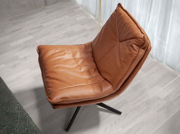 Swivel armchair in brown leather