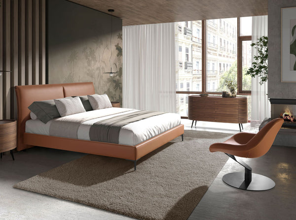 Swivel armchair in brown synthetic leather