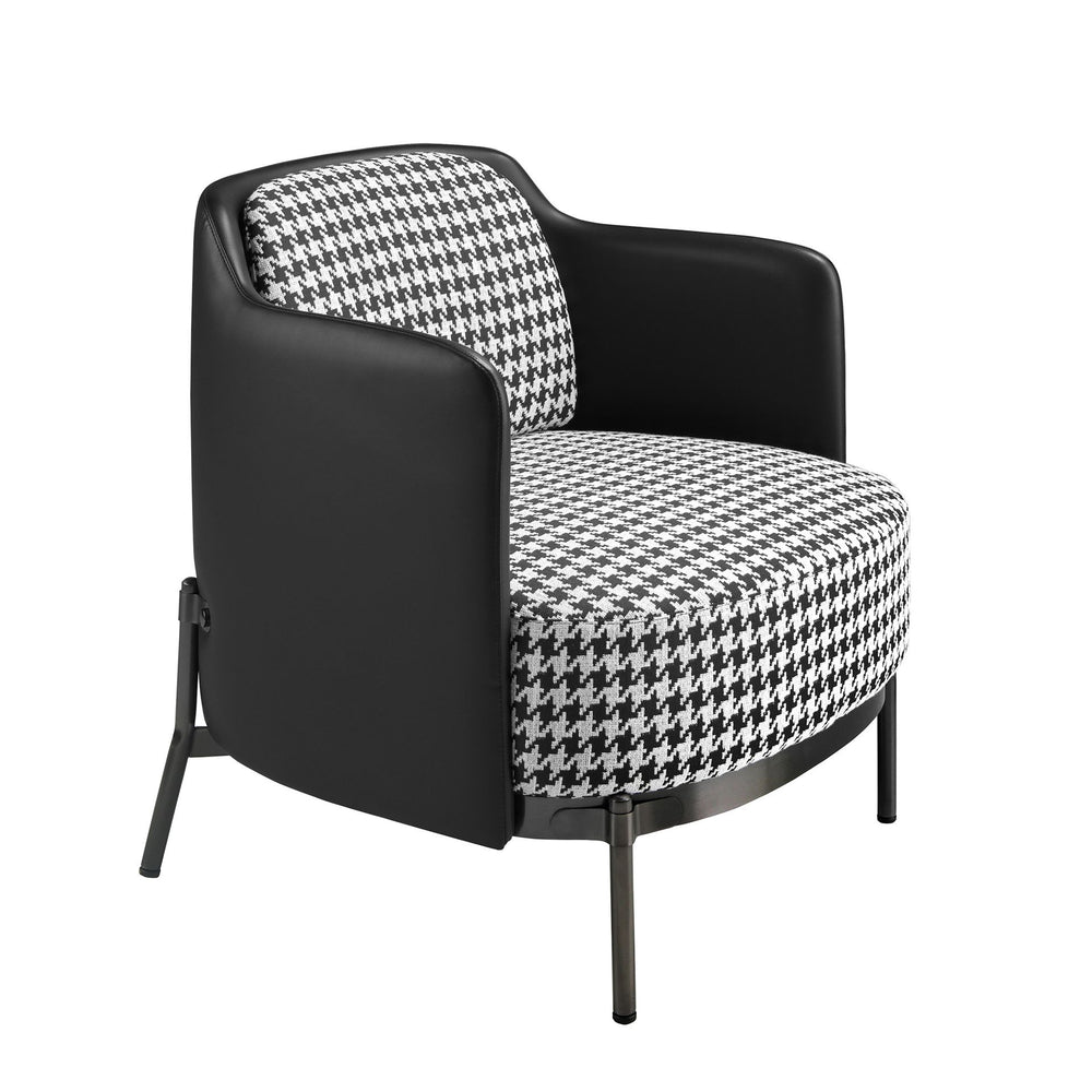 Armchair in black and white fabric and black synthetic leather