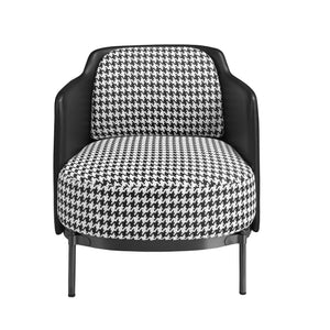 Armchair in black and white fabric and black synthetic leather