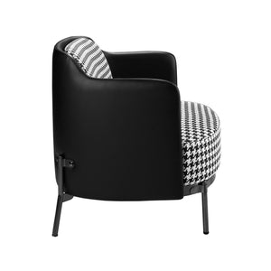 Armchair in black and white fabric and black synthetic leather