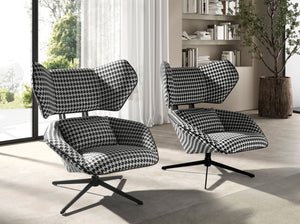 Swivel armchair in black and white fabric