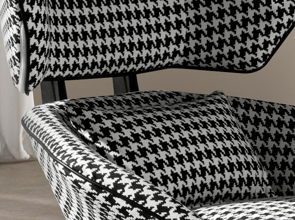 Swivel armchair in black and white fabric