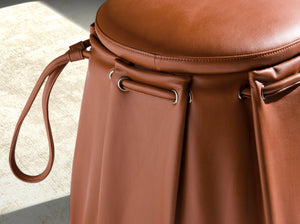 Caldera orange leather pouf