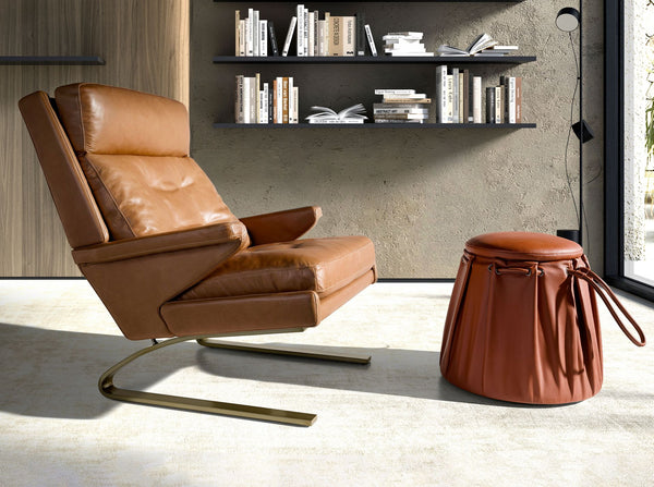 Caldera orange leather pouf