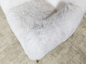 White armchair in long pile fabric