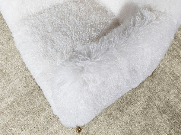 White armchair in long pile fabric