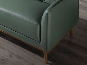 Left chaise longue sofa in green leather