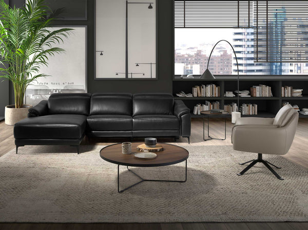 Relaxing sofa with left-hand chaise longue in black leather